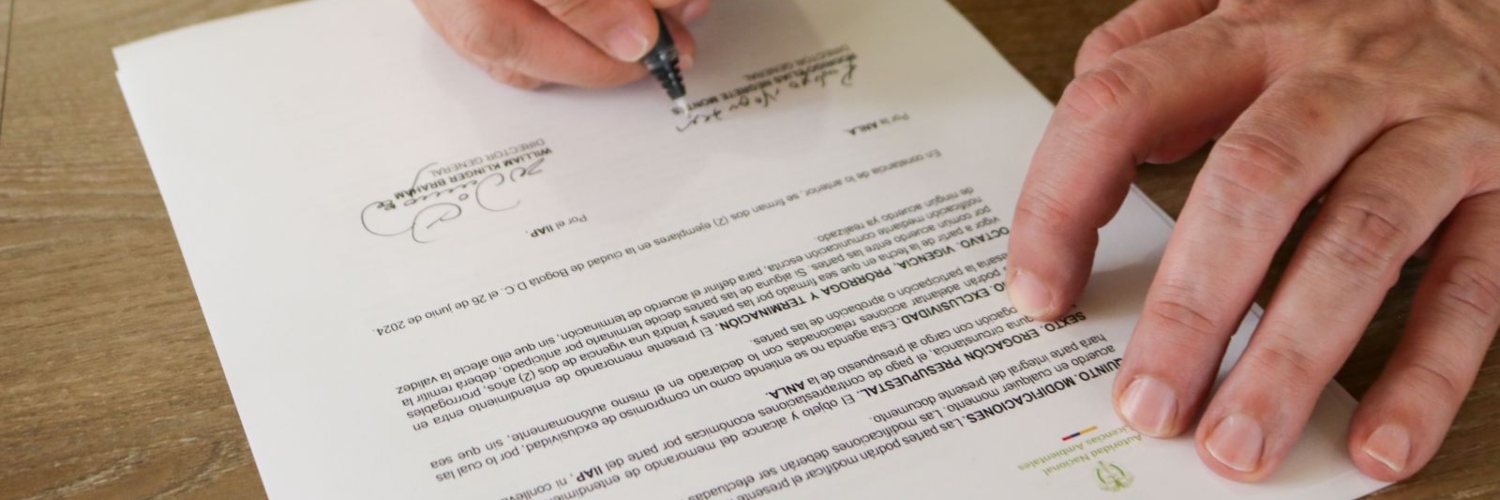 Imagen del memorando de entendimiento con firmas de directivos